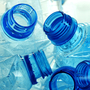 A pile of smashed plastic bottles. A pile of smashed plastic bottles.