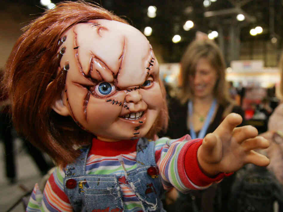 Visitors look at the Chucky doll from the Bride of Chucky movie, at the Sideshow Collectibles booth during the American International Toy Fair, Sunday, Feb. 12, 2006 in New York. Visitors look at the Chucky doll from the Bride of Chucky movie, at the Sideshow Collectibles booth during the American International Toy Fair, Sunday, Feb. 12, 2006 in New York.