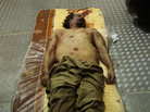 Moammar Gadhafi's body has been kept in a commercial freezer at a shopping center in Misrata, Libya. Moammar Gadhafi's body has been kept in a commercial freezer at a shopping center in Misrata, Libya.