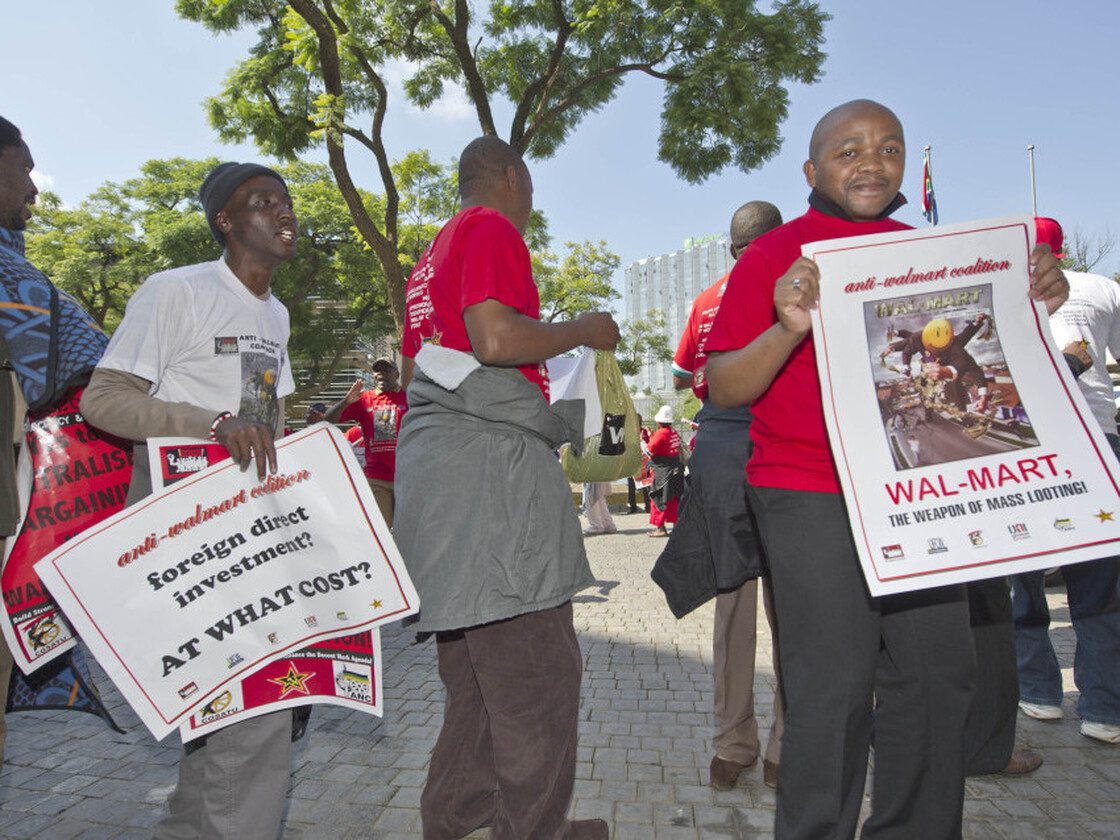 Members of the South African Commercial, Catering and Allied Workers Union protest against Walmart's acquisition of Massmart, southern Africa's largest retailer, in May. The deal was initially approved but is now under review.