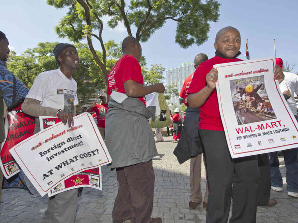 Members of the South African Commercial, Catering and Allied Workers Union protest against Walmart's acquisition of Massmart, southern Africa's largest retailer, in May. The deal was initially approved but is now under review.