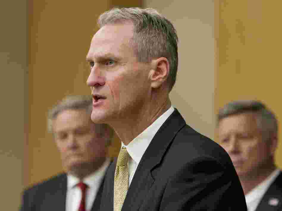 South Dakota Gov. Dennis Daugaard, seen here at a news conference in October, spent seven years in leadership positions at Children's Home Society before becoming the state's governor. South Dakota Gov. Dennis Daugaard, seen here at a news conference in October, spent seven years in leadership positions at Children's Home Society before becoming the state's governor.