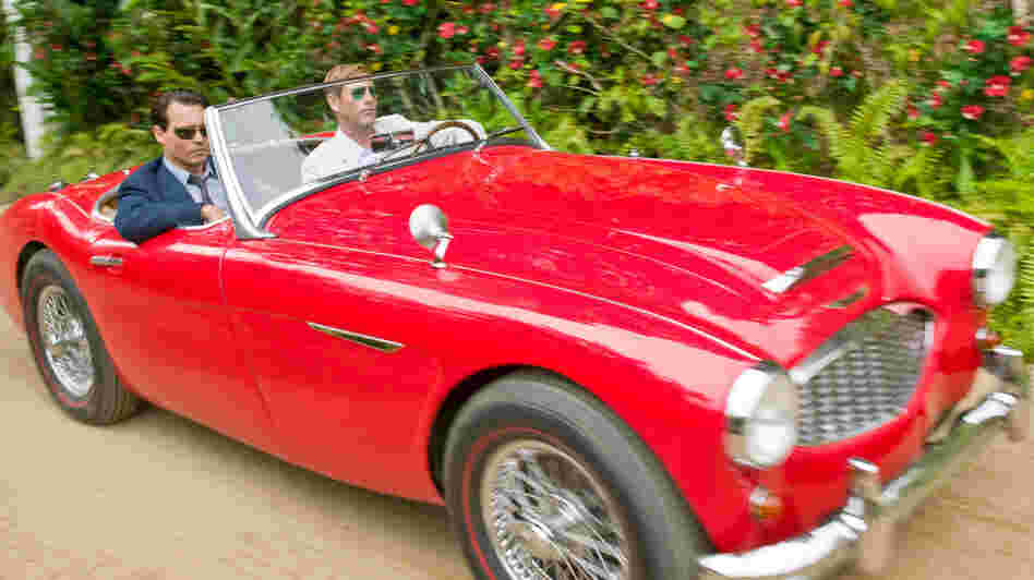 A Good Ride: Journalist Paul Kemp (Johnny Depp, left) is looking for more than a story in The Rum Diary, based on a semi-autobiographical story by Hunter S. Thompson. A Good Ride: Journalist Paul Kemp (Johnny Depp, left) is looking for more than a story in The Rum Diary, based on a semi-autobiographical story by Hunter S. Thompson.