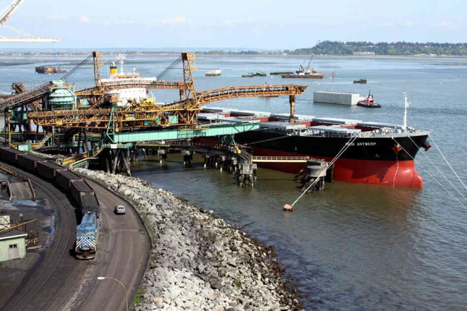 Conveyors load the coal from the trains onto ships bound for Asia. Coal produces huge amounts of carbon dioxide when it's burned, and federal climate policy is silent on this potentially large source of emissions. 