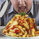 Male binge eaters were more likely to be depressed and obese than men who didn't binge, a study found.