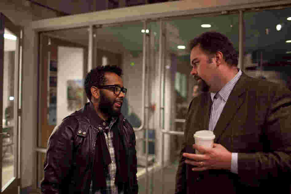 Josh Jackson speaks with drummer Jamire Williams outside the venue.