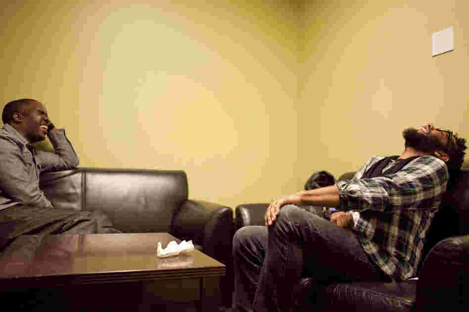 Derrick Hodge with Jamire Williams, backstage.
