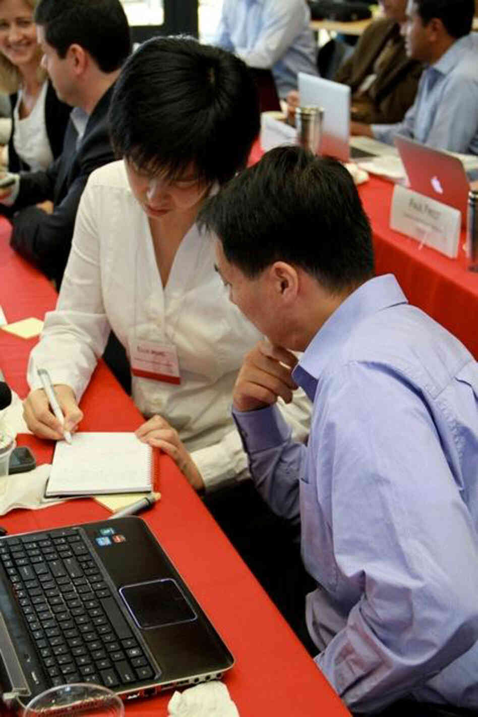 Ellis Meng and Tuan Hoang, researchers from the University of Southern California, brainstorm as part of their Innovation Corps course. Their project is an implantable device for drug delivery, connected by a wireless network to let physicians remotely track the patients' progress.