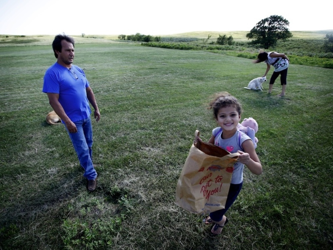 Dwayne Stenstrom and his wife, Rose, live on South Dakota's Rosebud reservation, where they raised six children. Also pictured is their granddaughter.