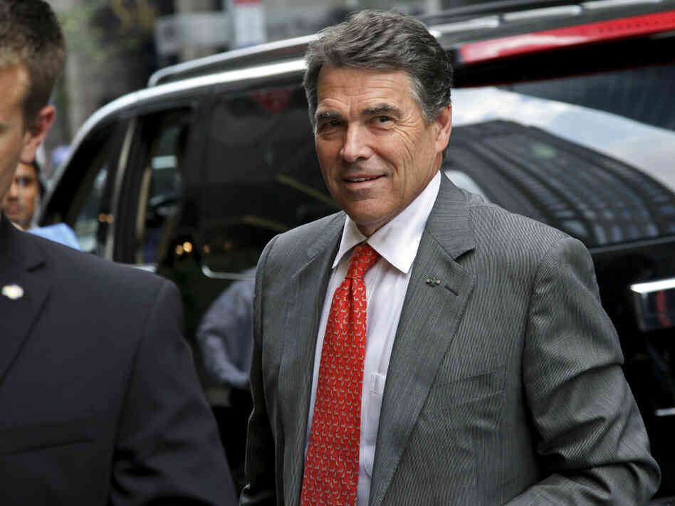 Texas Gov. Rick Perry arrives at Trump Tower in New York for a meeting with real estate developer Donald Trump in September. 