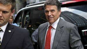 Texas Gov. Rick Perry arrives at Trump Tower in New York for a meeting with real estate developer Donald Trump in September.
