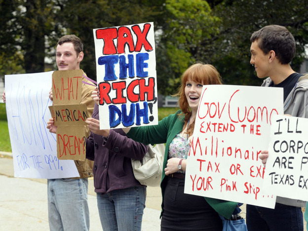 Demonstrators supporting the Occupy Wall Street movement — and an extension of the millionaires tax in New York — protest in Albany on Oct. 21.