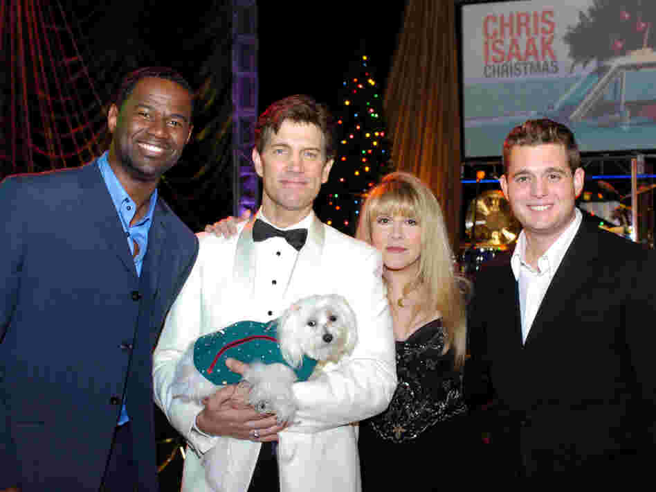 Rodney the Maltese dog in a suit made by Jaime Custom Tailors. From left to right: Brian McKnight, Chris Isaak, Stevie Nicks and Michael Buble.