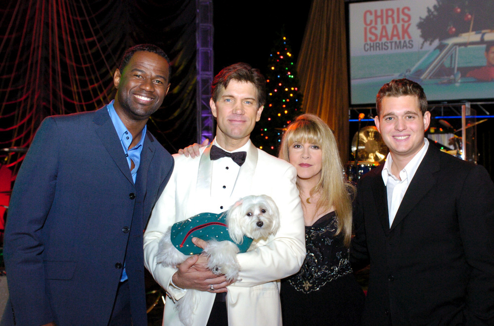 Rodney the Maltese dog in a suit made by Jaime Custom Tailors. From left to right: Brian McKnight, Chris Isaak, Stevie Nicks and Michael Buble.