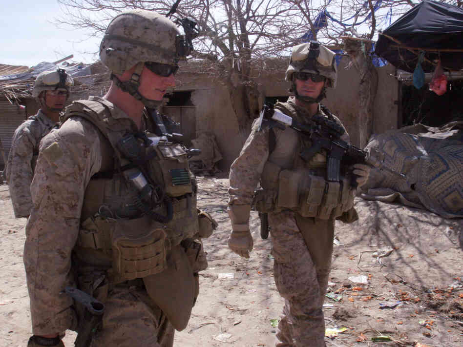 Lt. Col. Jason Morris (right), the commanding officer for 3rd Battalion, 5th Marine Regiment, discusses the Marines' progress during Operation Golden Shillelagh in Malmand, Afghanistan, on March 12, with 1st Lt. Charles Broun.