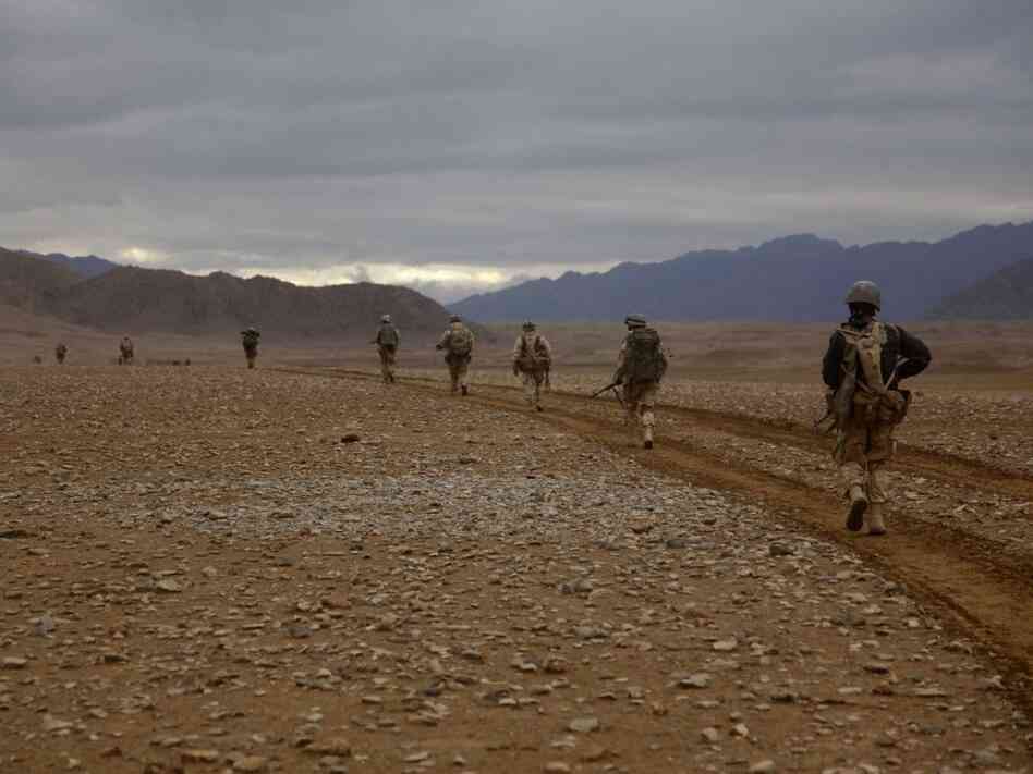 Marines of the 3rd Battalion, 5th Regiment conduct a search operation in Sangin district, Afghanistan, on Feb.18, 2011. Roadside bombs were a constant threat on such patrols.