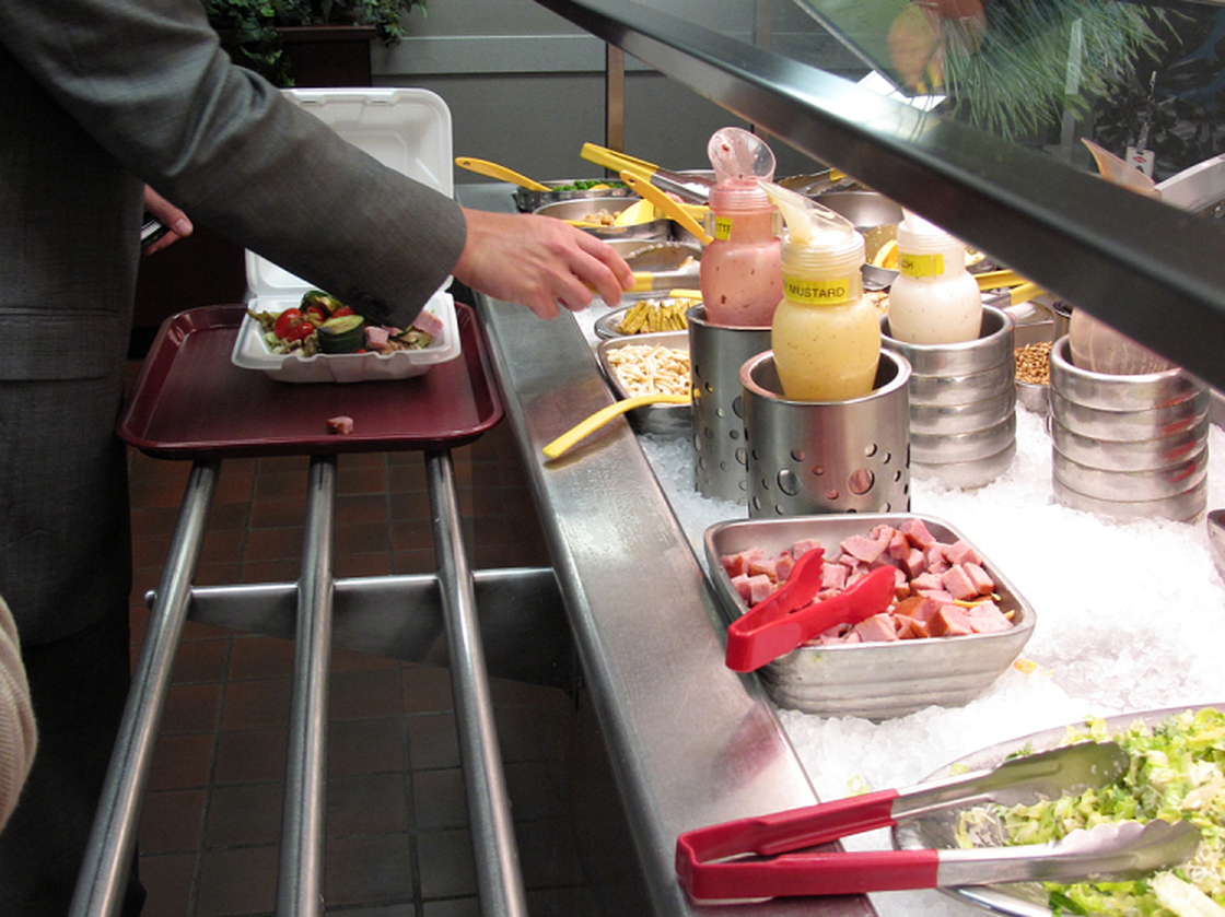 To encourage healthy choices, Dow's corporate cafeteria features color-coded utensils. Healthy foods like broccoli, spinach and beets have green handles. Yellow handles mean caution, and red is for temptations like bacon bits and high-fat dressing.