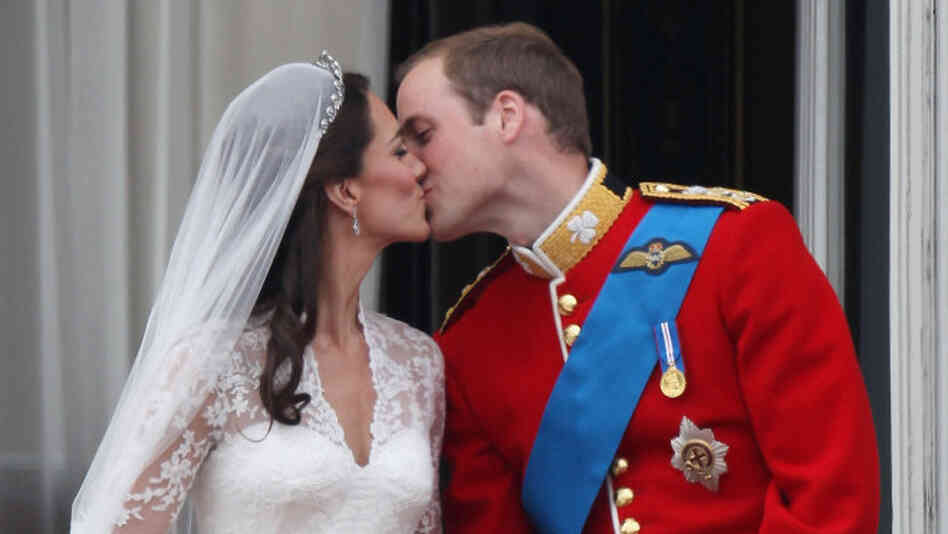 April 29, 2011: Their Royal Highnesses Prince William, Duke of Cambridge and Catherine, Duchess of Cambridge kiss on the balcony at Buckingham Palace after their wedding.
