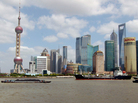 Lujiazui, Shanghai's financial district, includes the world's third- and sixth-tallest buildings. The city's population is 23 million. Lujiazui, Shanghai's financial district, includes the world's third- and sixth-tallest buildings. The city's population is 23 million.