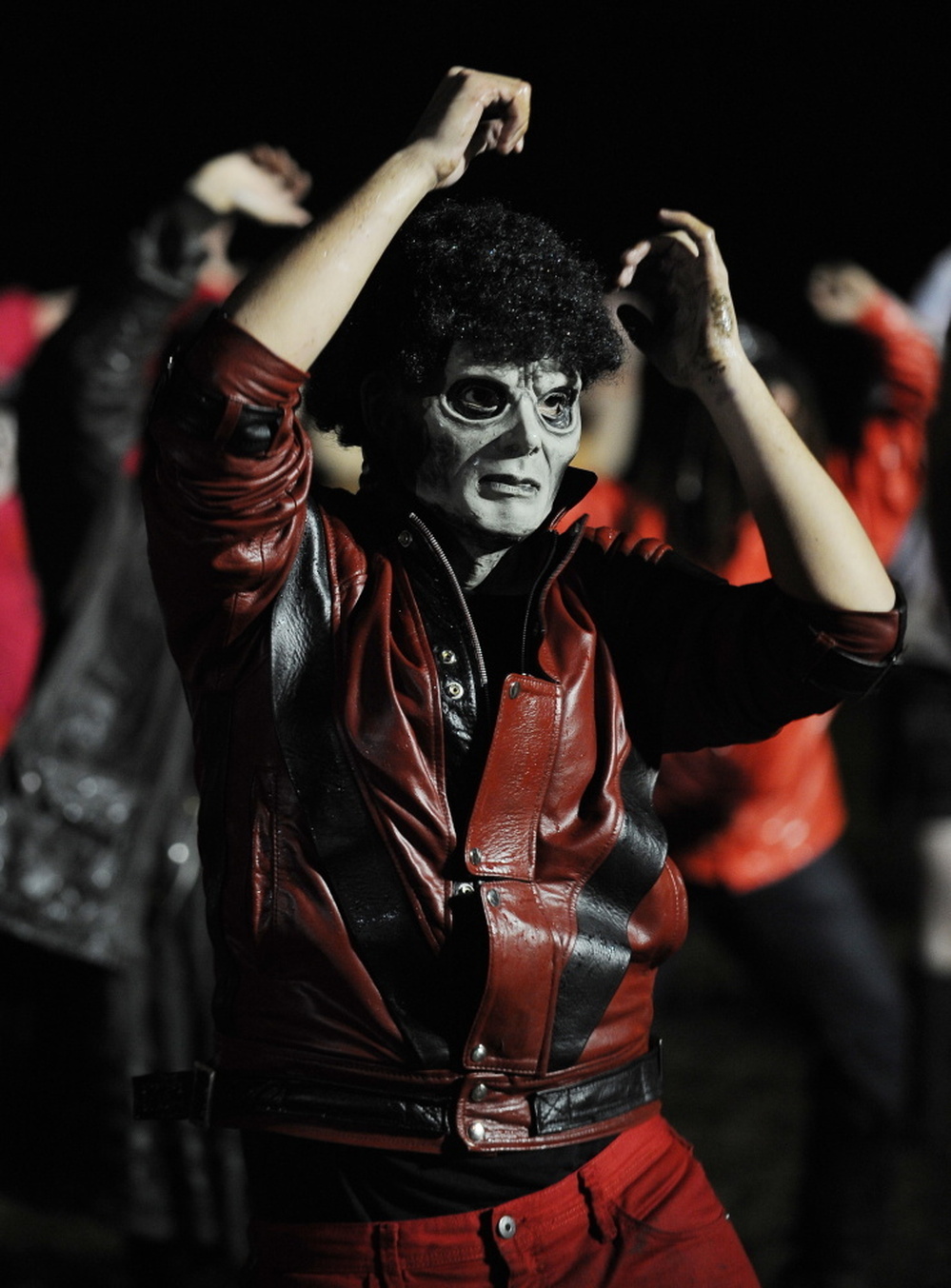 A fan dressed as Michael Jackson's zombie character participates in the 2009 "Thrill the World: A Global Tribute to Michael Jackson" in Astoria Park in the Queens section of New York.