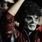 A fan dressed as Michael Jackson's zombie character participates in the 2009 "Thrill the World: A Global Tribute to Michael Jackson" in Astoria Park in the Queens section of New York. A fan dressed as Michael Jackson's zombie character participates in the 2009 "Thrill the World: A Global Tribute to Michael Jackson" in Astoria Park in the Queens section of New York.
