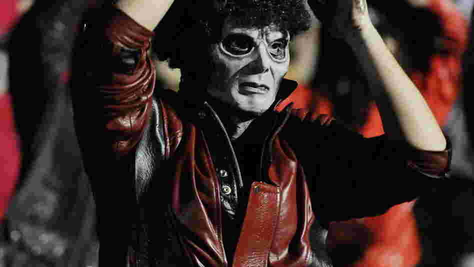 A fan dressed as Michael Jackson's zombie character participates in the 2009 "Thrill the World: A Global Tribute to Michael Jackson" in Astoria Park in the Queens section of New York.