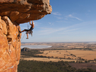 A man rock climbing. A man rock climbing.