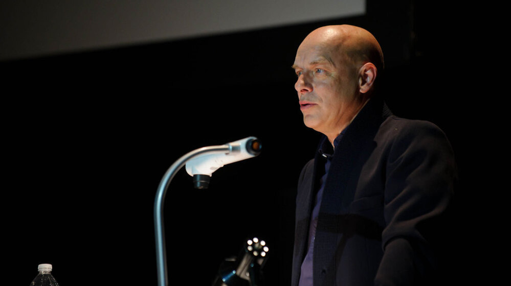 Brian Eno on stage during his "Illustrated Talk" at Moogfest 2011.