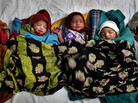 Newborns lie together at a district women's hospital in Allahabad, in India's most populous state of Uttar Pradesh. Fifty-one babies are born in India every minute. Newborns lie together at a district women's hospital in Allahabad, in India's most populous state of Uttar Pradesh. Fifty-one babies are born in India every minute.