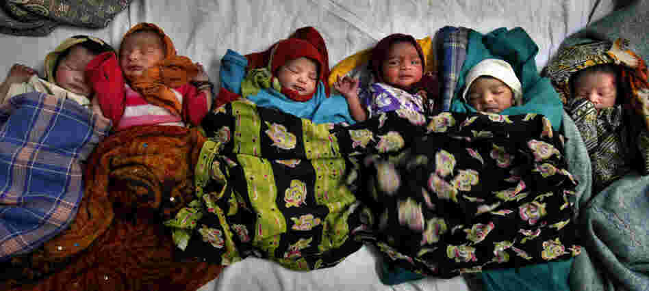 Newborns lie together at a district women's hospital in Allahabad, in India's most populous state of Uttar Pradesh. Fifty-one babies are born in India every minute.