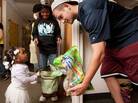 At Washington University in St. Louis on Sunday, student Andrew Dwoskin was handing out candy to local children during a "Safe Trick-or-Treat" event. At Washington University in St. Louis on Sunday, student Andrew Dwoskin was handing out candy to local children during a "Safe Trick-or-Treat" event.