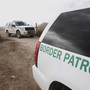  U.S. Border Patrol vehicles drive from a checkpoint in December 2010, as teams of border officers comb the Arizona desert about 10 miles north of Mexico in search for a suspect in the fatal shooting of U.S. Border Patrol agent Brian Terry in the rugged terrain in Rio Rico, Ariz. 