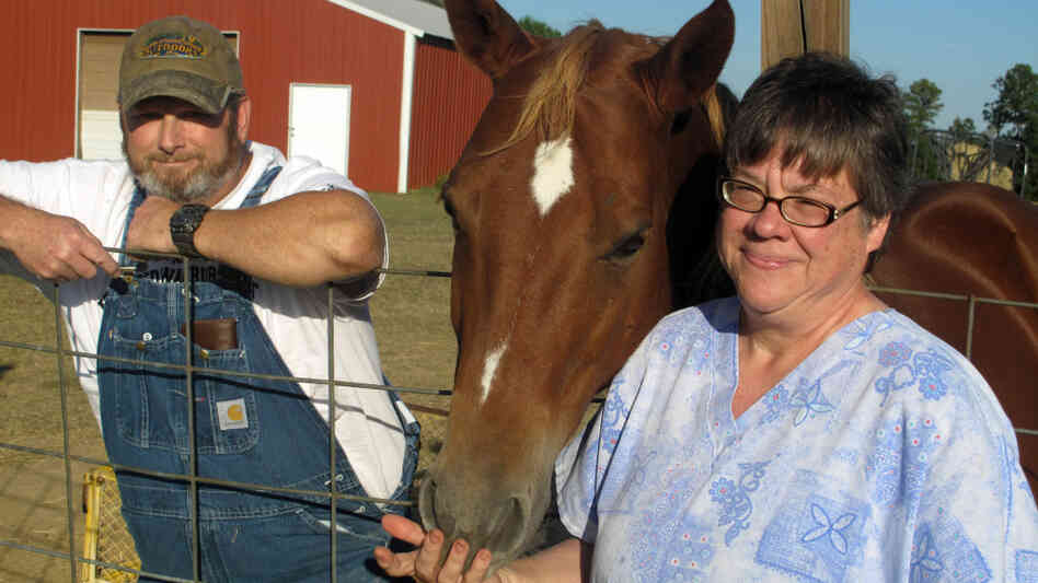 Norris and Janis Galatas at their home in Collinsville, Miss., with their horse, Cinnamon. The couple is struggling to make their mortgage payments. Norris and Janis Galatas at their home in Collinsville, Miss., with their horse, Cinnamon. The couple is struggling to make their mortgage payments.