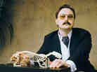 "I could be wrong, you know:" John Hodgman notes that while his book That Is All is intensely concerned with "the coming global superpocalypse," it also contains much information about travel and sports and wine, and is "not depressing." 