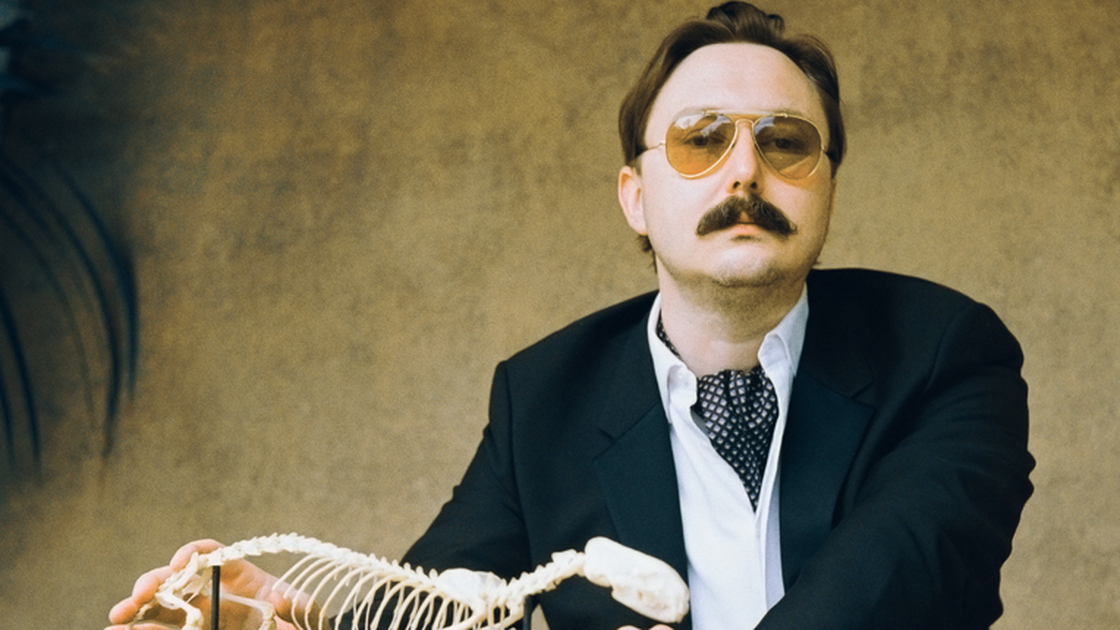 "I could be wrong, you know:" John Hodgman notes that while his book That Is All is intensely concerned with "the coming global superpocalypse," it also contains much information about travel and sports and wine, and is "not depressing." 