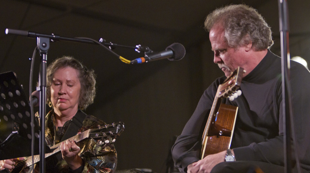 Mary Flower and Pat Donohue perform on Mountain Stage in Grand Marais, Minn., at the North House Folk School.