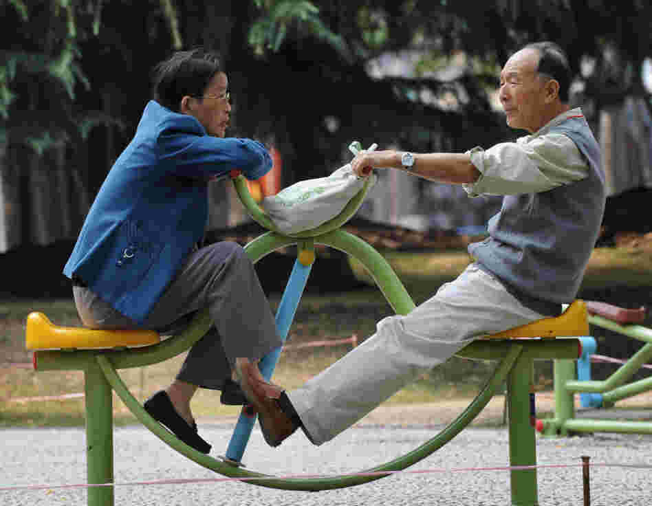 An elderly Chinese man and woman chat at a park in Shanghai. Hundreds of elderly Shanghai residents make their way to IKEA twice a week for an informal lonely hearts club. An elderly Chinese man and woman chat at a park in Shanghai. Hundreds of elderly Shanghai residents make their way to IKEA twice a week for an informal lonely hearts club.