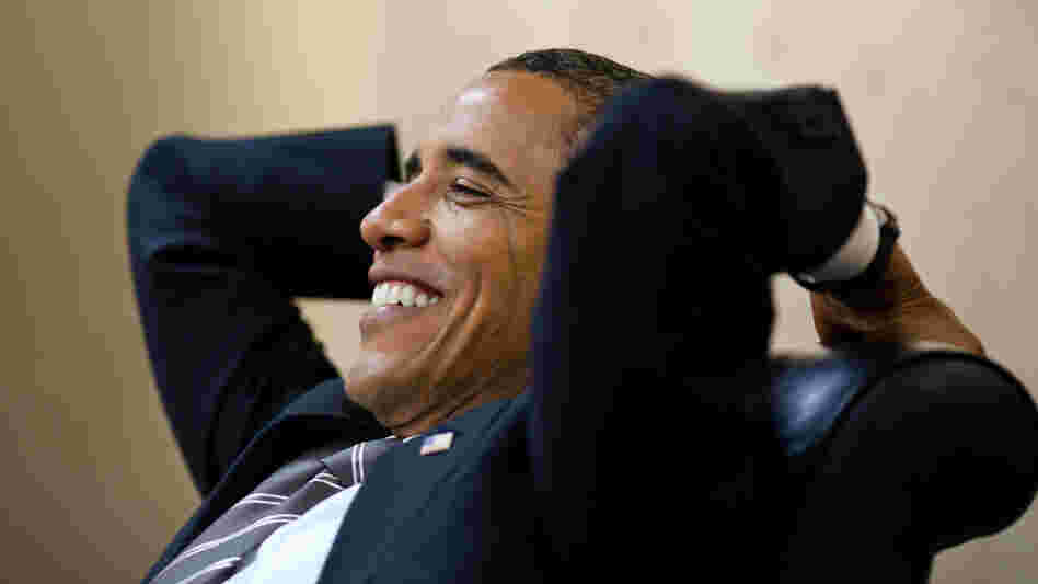 A relaxed and fit President Obama meets with senior advisers at the White House in early July. 