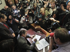 Texas Gov. Rick Perry fills out his papers to be on the New Hampshire's presidential primary ballot, Friday, Oct. 28, 2011. Texas Gov. Rick Perry fills out his papers to be on the New Hampshire's presidential primary ballot, Friday, Oct. 28, 2011.