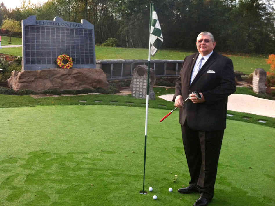 Memorial Golf Park creator Arne Swanson stands on its putting green — an ossuary with enough capacity to hold 600 former avid golfers. Families can purchase a spot on the solemn "leader board" to preserve the loved one's standing for all eternity. Memorial Golf Park creator Arne Swanson stands on its putting green — an ossuary with enough capacity to hold 600 former avid golfers. Families can purchase a spot on the solemn "leader board" to preserve the loved one's standing for all eternity.