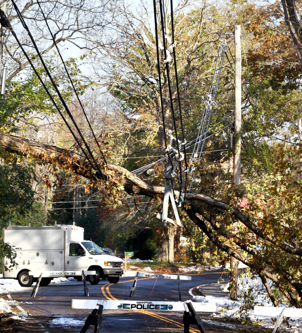 Monday: Downed power lines in North Andover, Mass. 