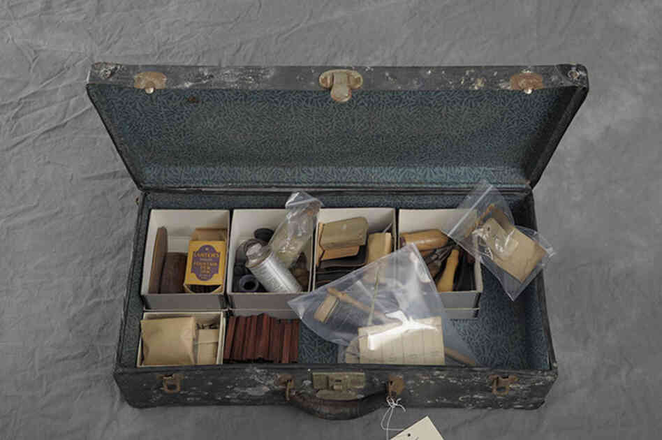 A suitcase owned by Maude Ketchman contains tools and materials for crafting.