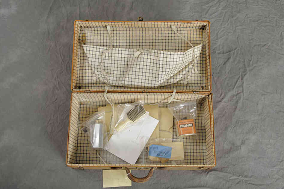 Fred Butters brought with him to Willard a metal container of talc, a Polident can, blank postcards and letters.