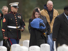 Kait Wyatt carries her 1-month-old son, Michael, at the burial for her husband, Marine Cpl. Derek Wyatt, at Arlington National Cemetery, Jan. 7. Wyatt was killed Dec. 6, 2010, in Afghanistan. Kait Wyatt, who was pregnant at the time of her husband's death, was induced the day after he was killed so she could attend the service. Kait Wyatt carries her 1-month-old son, Michael, at the burial for her husband, Marine Cpl. Derek Wyatt, at Arlington National Cemetery, Jan. 7. Wyatt was killed Dec. 6, 2010, in Afghanistan. Kait Wyatt, who was pregnant at the time of her husband's death, was induced the day after he was killed so she could attend the service.