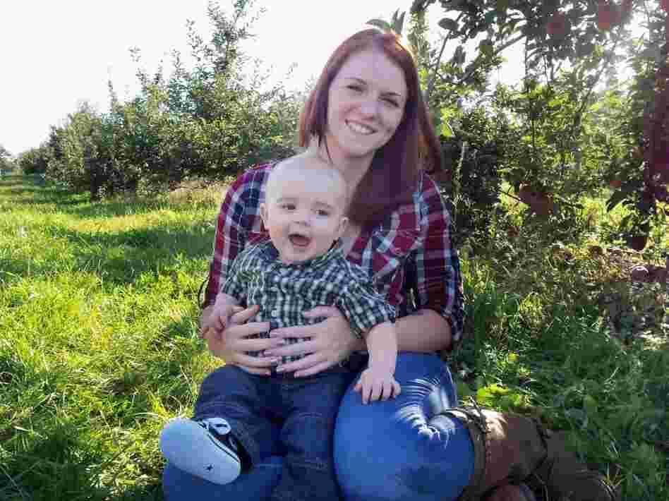 A former Marine herself, Kait Wyatt (seen with son Michael at an apple orchard in New York) says she is still struggling with the meaning of her husband's death. She knows he died doing what he believed in — and yet mourns the loss of her husband, and of her son's father.
