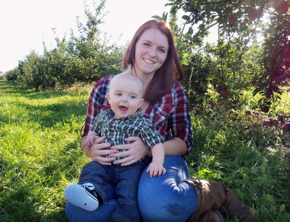 A former Marine herself, Kait Wyatt (seen with son Michael at an apple orchard in New York) says she is still struggling with the meaning of her husband's death. She knows he died doing what he believed in — and yet mourns the loss of her husband, and of her son's father.