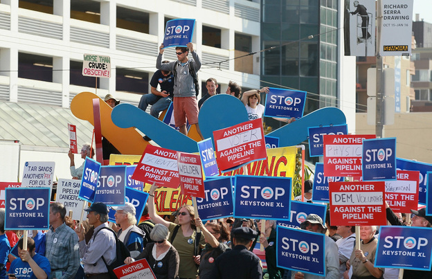 Protesters demonstrate last month against the construction of the Keystone XL oil pipeline outside the W Hotel in San Francisco, before the arrival of President Obama, who was holding a fundraiser.
