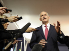 Greek Prime Minister George Papandreou gestures while talking during a press conference following crisis talks with France's President, Germany's Chancellor, senior EU leaders and IMF director in Cannes, France. Greek Prime Minister George Papandreou gestures while talking during a press conference following crisis talks with France's President, Germany's Chancellor, senior EU leaders and IMF director in Cannes, France.