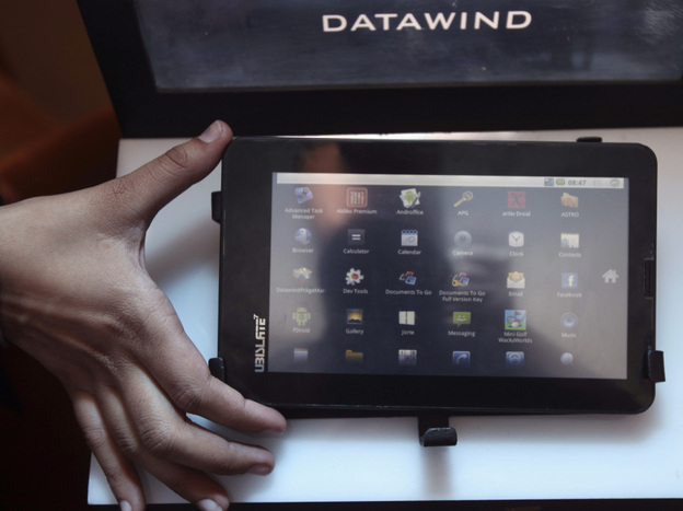 The Aakash tablet computer (shown here during its Oct. 5 launch in New Delhi) can be used for functions like word processing, Web browsing and video conferencing. It has a battery life of about three hours.