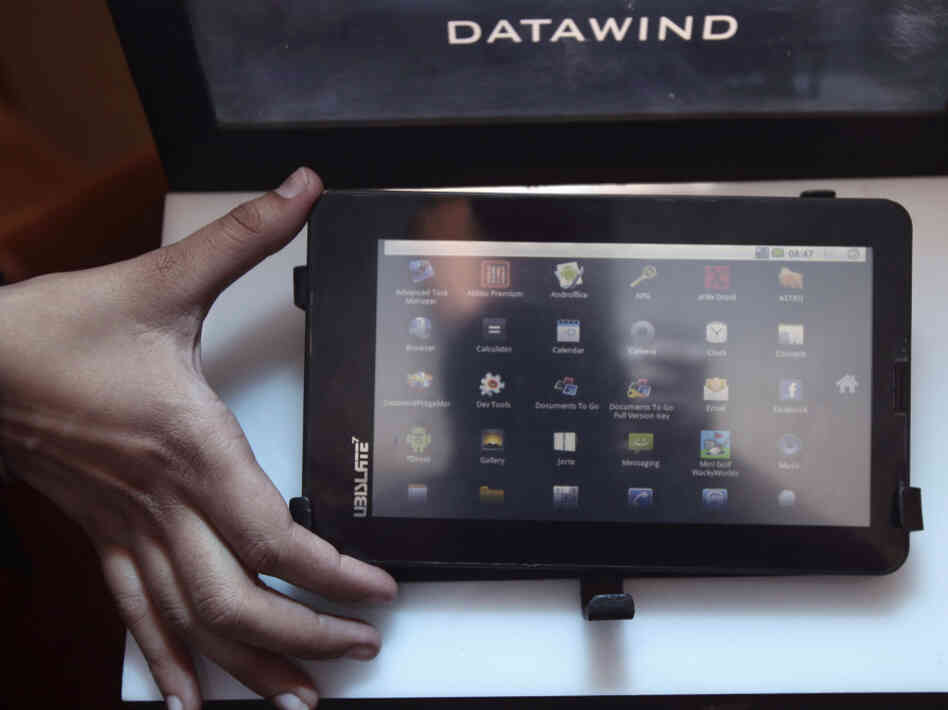 The Aakash tablet computer (shown here during its Oct. 5 launch in New Delhi) can be used for functions like word processing, Web browsing and video conferencing. It has a battery life of about three hours.
